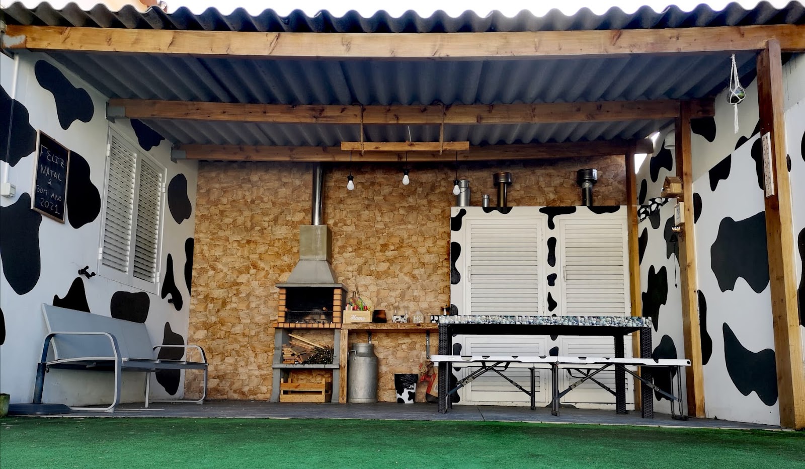 Azores Cow House cow-print exterior and courtyard